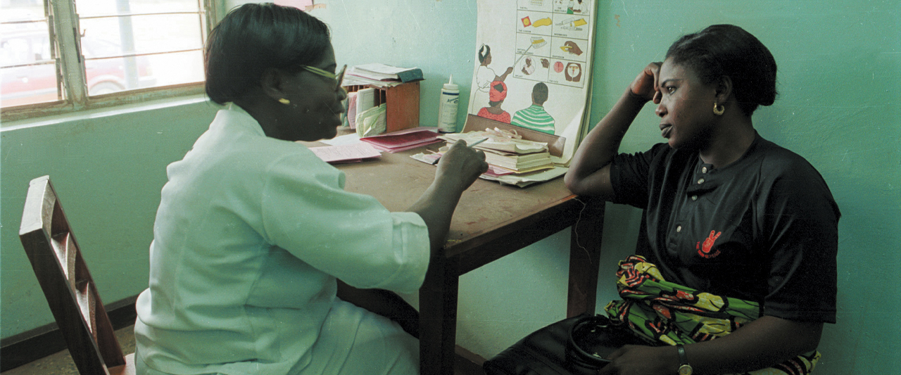 Nigerian women talking at family planning clinic