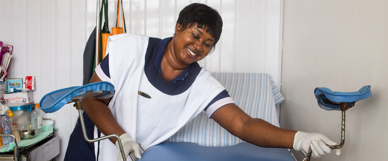 Nurse Florence G. Ampomah, police personnel at the Ghana Police Hospital, prepares the MVA room for a procedure.