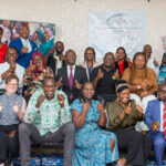 Members of the ESAParC in a group photo smiling giving a thumbs up