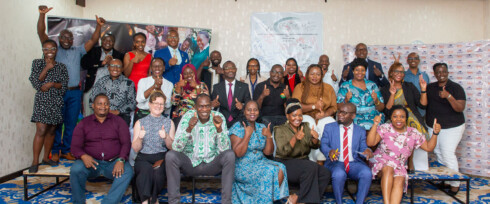 Members of the ESAParC in a group photo smiling giving a thumbs up