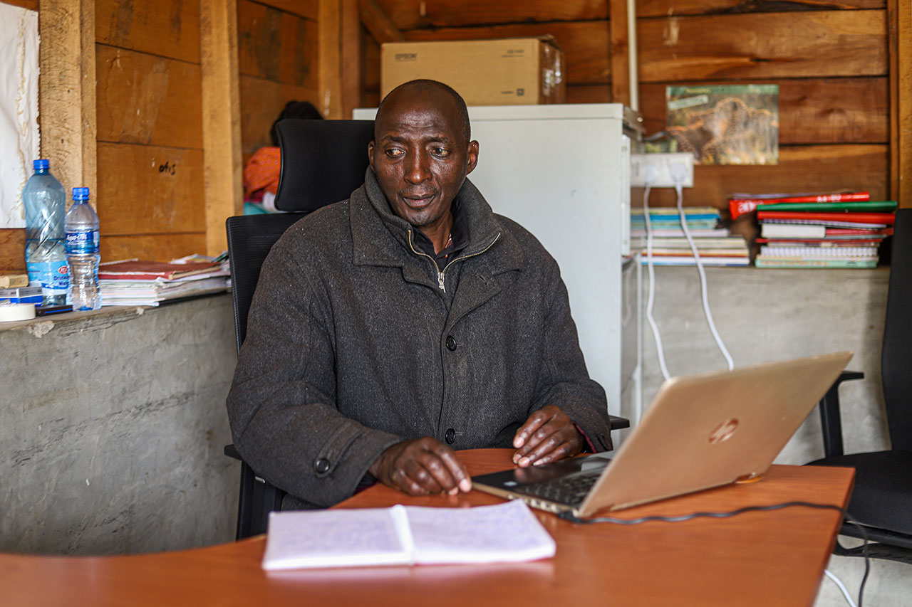 Amos Simpano sitting in his Entashata office