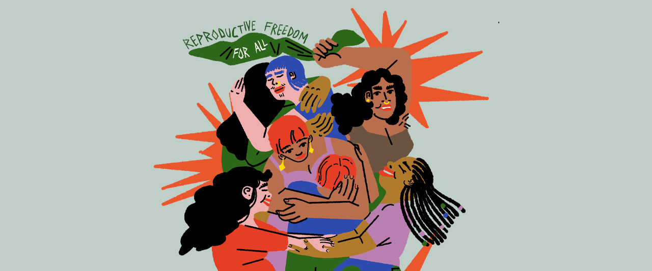 An illustration depicts a diverse group of six women standing close together in a supportive embrace. One woman holds a green bandana that reads "Reproductive Freedom for All" while orange rays radiate outward from the group, symbolizing empowerment and solidarity in the fight for reproductive freedom.